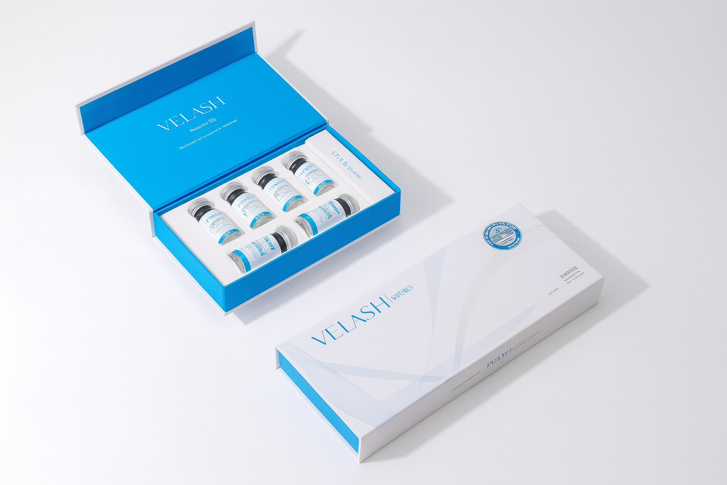 VelaSH Exo Plus 10ml vials by YOUNG&BEAUTY, showing seven small glass vials with white labels and blue caps on a white background.